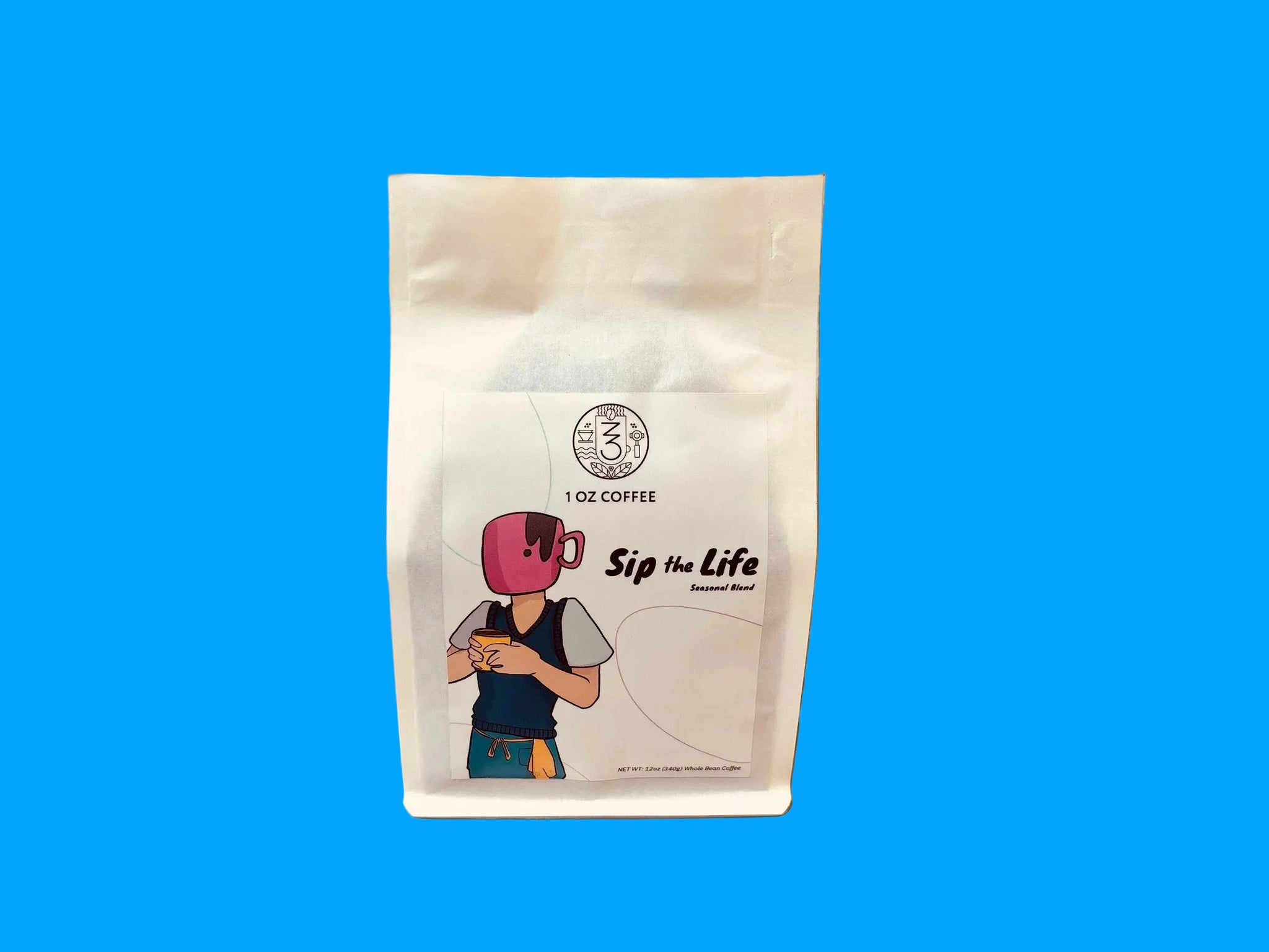 A white stand-up pouch of coffee labeled '1 oz Coffee Sip the Life' with a cartoon character illustration, standing on a wooden surface against a textured beige wall.